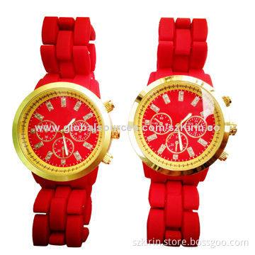 Fashion watch with plastic strap with rubber oil coating, metal case with golden coating